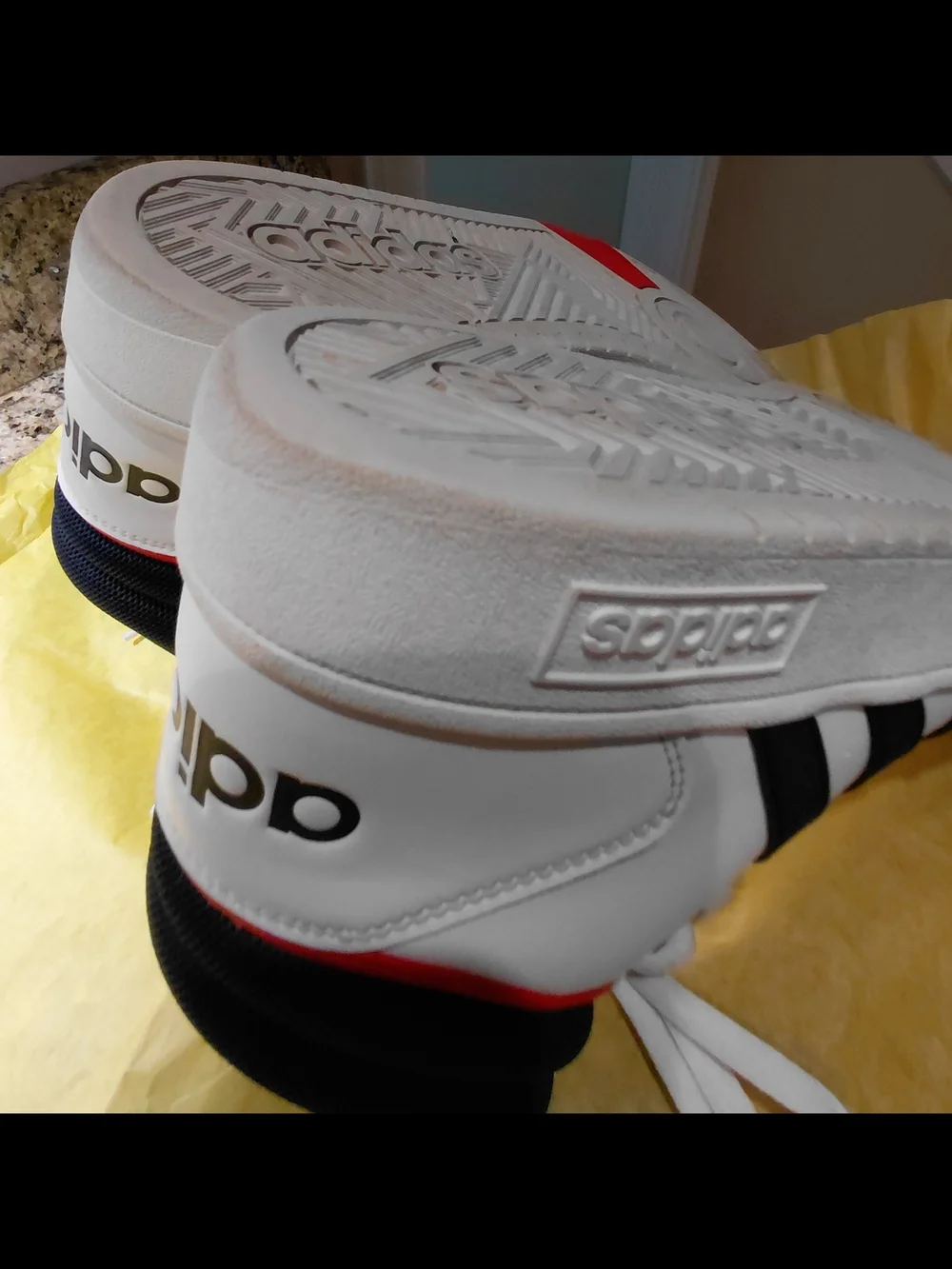 Adidas Men’s White High-Top Sneakers with Black Stripes and Red Trim